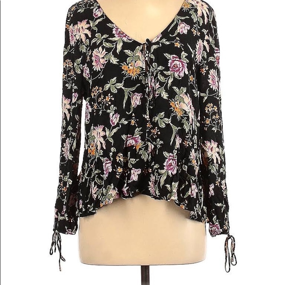 Black flowy floral blouse with open keyholes